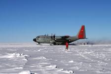 Jason taking a close up of the Herc taking off.JPG